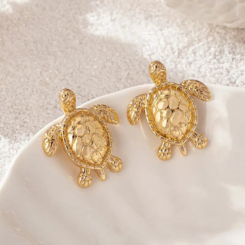 AROS TORTUGA MARINA BAÑO ORO 18K