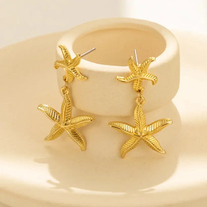 AROS ESTRELLAS MARINAS BAÑO ORO 18K