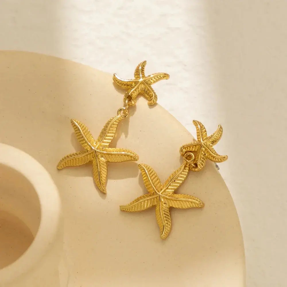 AROS ESTRELLAS MARINAS BAÑO ORO 18K